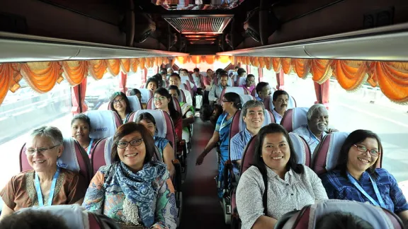 Delegates of the LWF Asia Pre-Assembly, Thailand, August 2016 relax in the bus following a pre-Assembly session. Photo: LWF/Arni Danielsson
