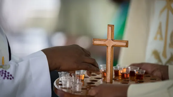 Bread and wine is distributed for holy communion during opening worship. Bread and wine is distributed for holy communion during opening worship.