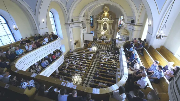 Lutherans from around the globe join local congregants for Sunday worship at the Lutheran church in Bystřice, Czech Republic, as part of their participation in the LWF Thirteenth Assembly. Photo: LWF/Marie Renaux