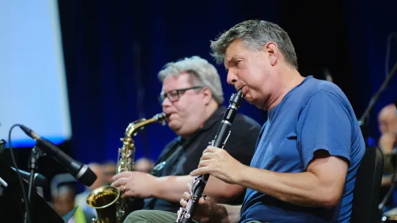 Dr Uwe Steinmetz (left) from Germany and Dr Carl Petter Opsahl (right) from Norway playing saxophone and clarinette during worship at the LWF Thirteenth Assembly in Kraków, Poland. Photo: LWF/M. Renaux